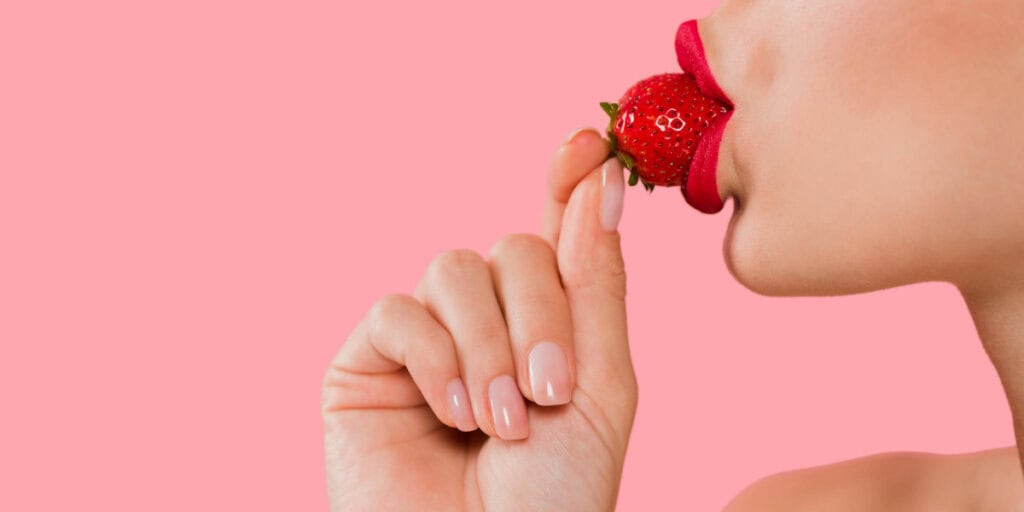 Eating a strawberry