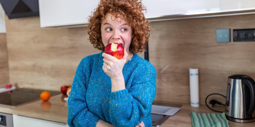 Woman enjoying an apple