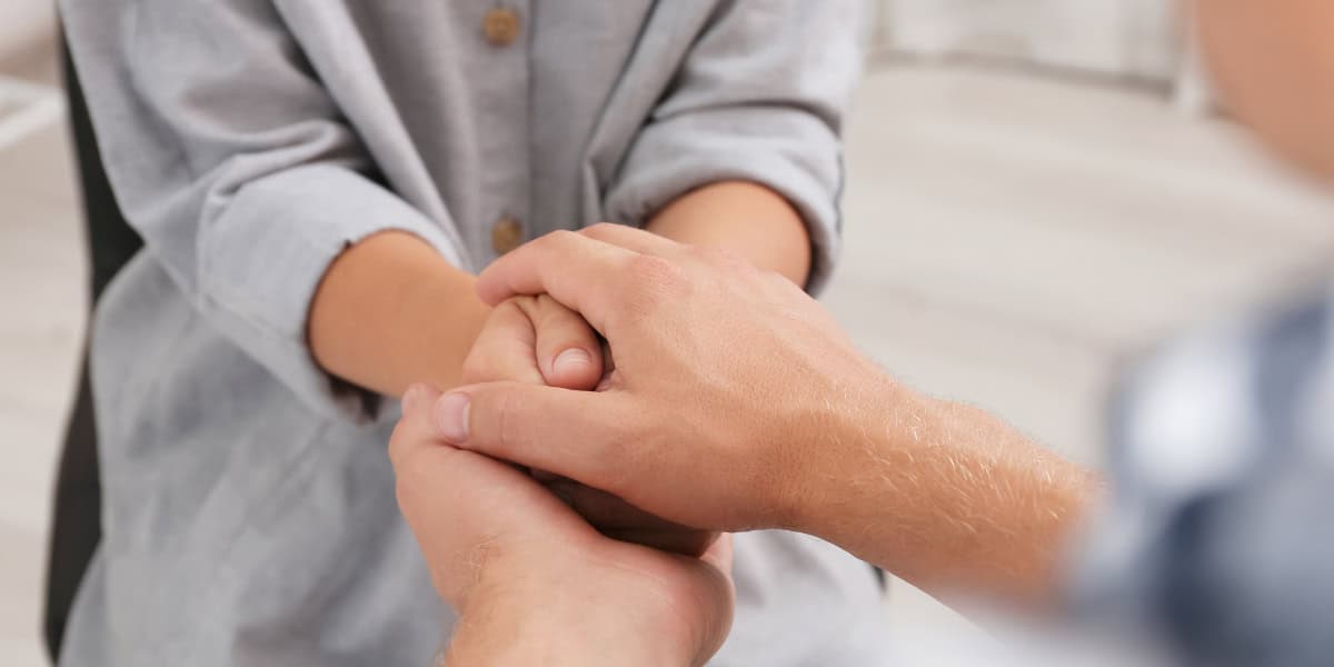 Compassion hand holding