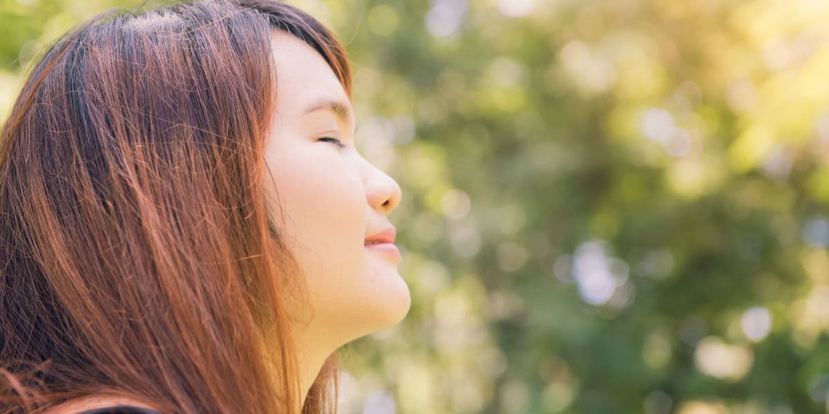 deep breathing woman