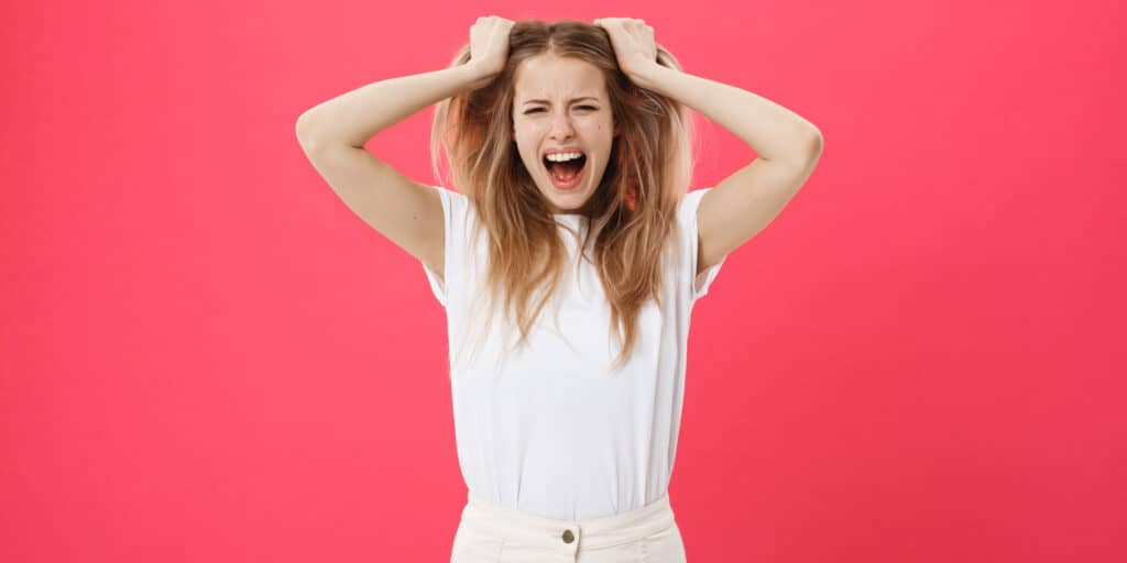 stressed woman red background