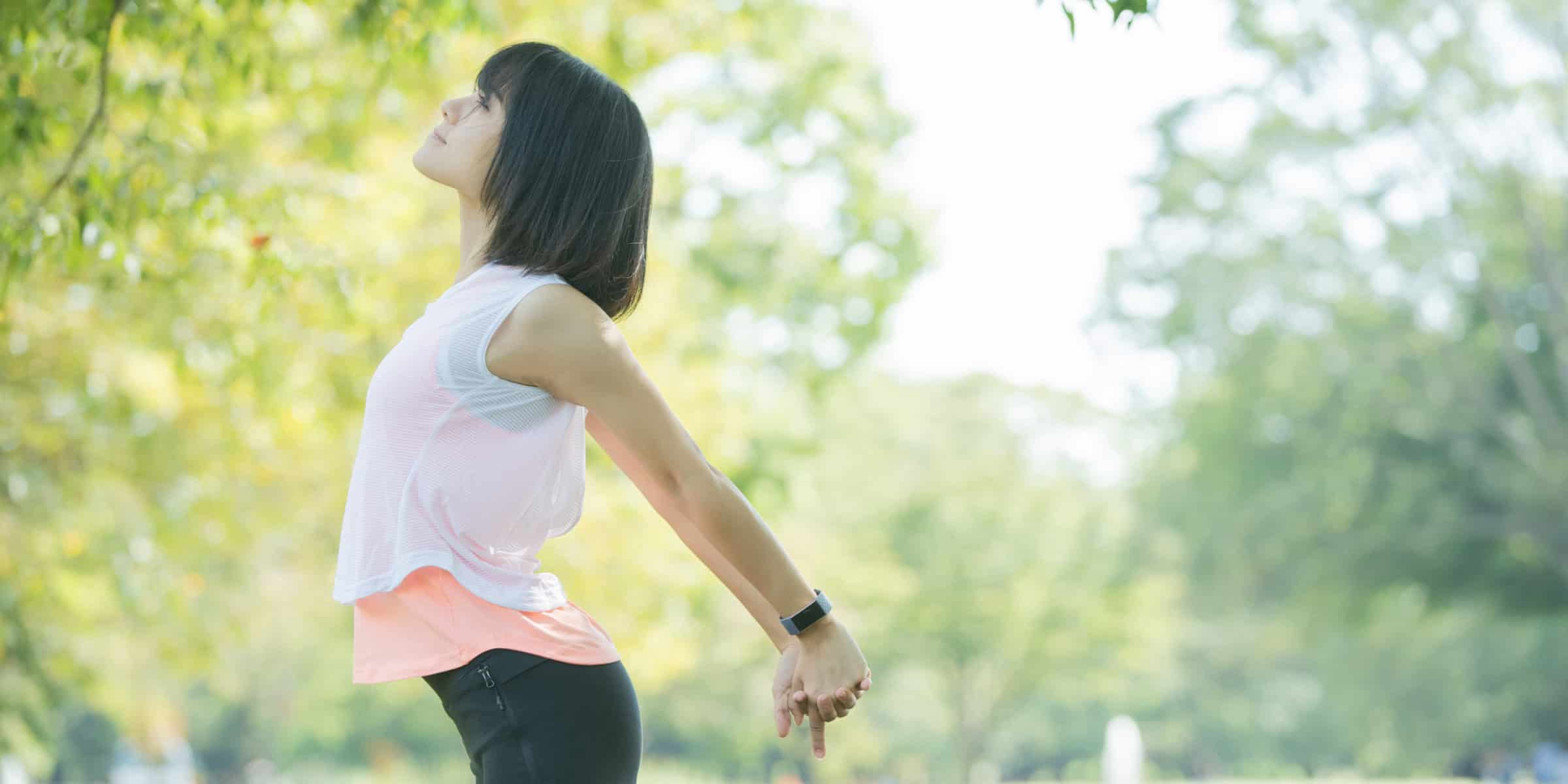 woman breathing outdoors