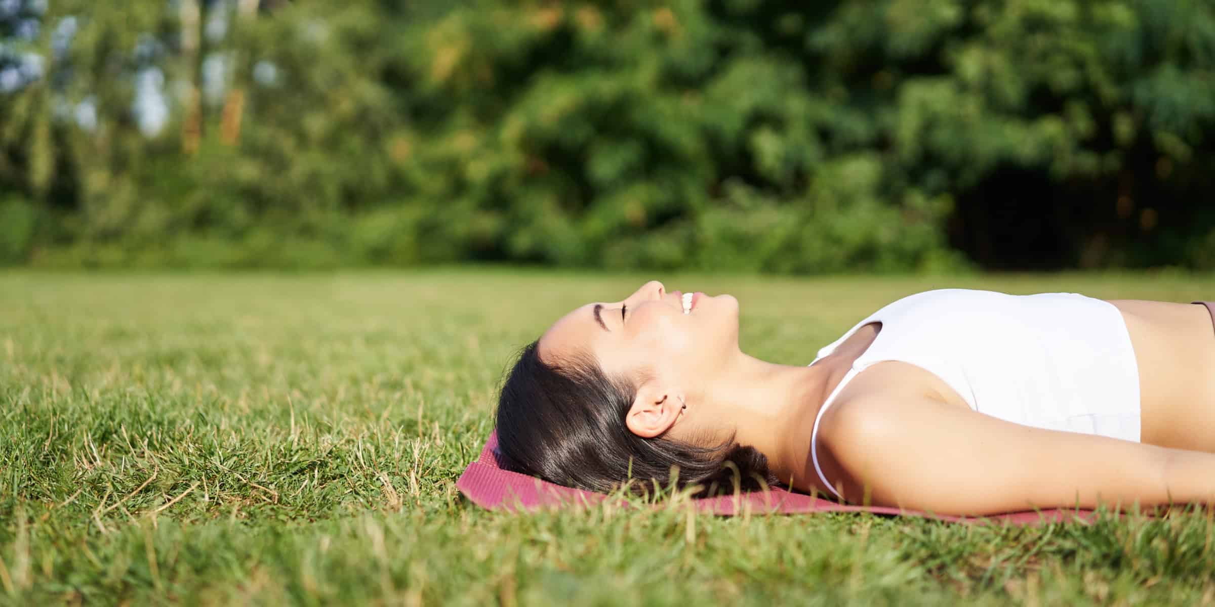 woman inhaling on grass 1