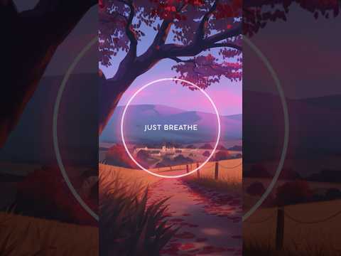 A scenic landscape with autumn trees, a winding path, distant mountains, and a circular overlay with the text "JUST BREATHE" in the center.