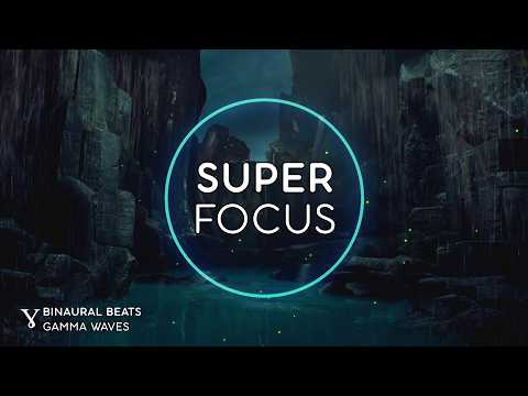 A dark, rocky canyon scene with glowing fireflies; the words "SUPER FOCUS" appear in a circle at the center, with "BINAURAL BEATS GAMMA WAVES" text at the bottom left.