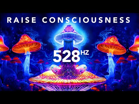A person sits cross legged on a large mushroom, surrounded by glowing mushrooms, with the text "RAISE CONSCIOUSNESS" and "528 Hz" displayed above.
