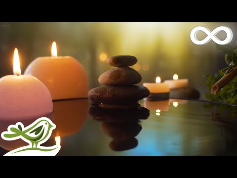 Four smooth stones stacked on a reflective surface with lit candles in the background; a bird graphic and infinity symbol are in the corners.