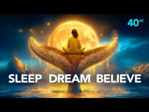A person sits on an ornate whale tail above water, facing a large glowing moon, with “SLEEP DREAM BELIEVE” in bold text and “40 Hz” in the upper right corner.