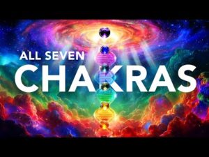 A vibrant, colourful depiction of the seven chakras aligned vertically, with the words "ALL SEVEN CHAKRAS" superimposed over a swirling cosmic background.