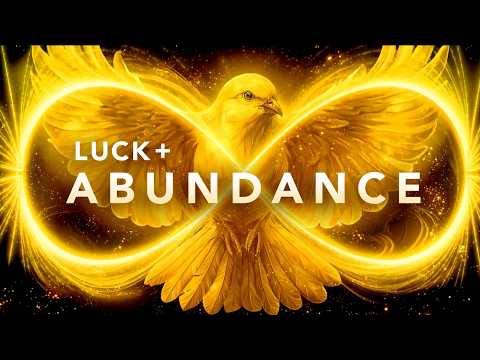 A golden bird with outstretched wings is surrounded by a glowing infinity symbol. The words "Luck + Abundance" appear in bold white text across the image.