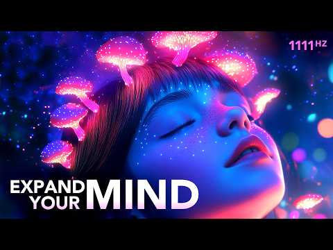 A person with closed eyes and glowing mushrooms on their head, surrounded by blue and pink light, with the text "Expand Your Mind" and "1111 Hz" displayed.
